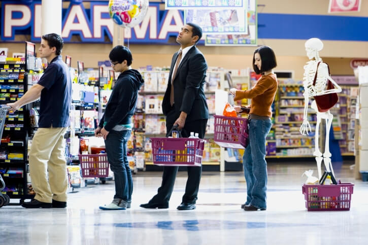 long queues outside the grocery store